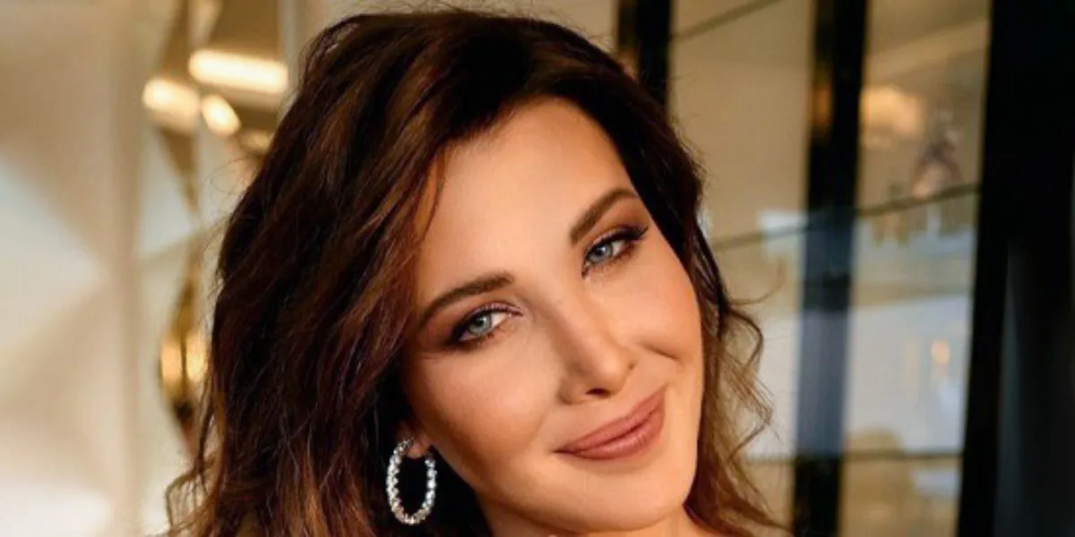 قاب صمیمی نانسی عجرم با همسر و سه دخترش